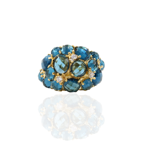 Anel em prata dourada, 925, com pedras hidrotermais azuis e zircônias